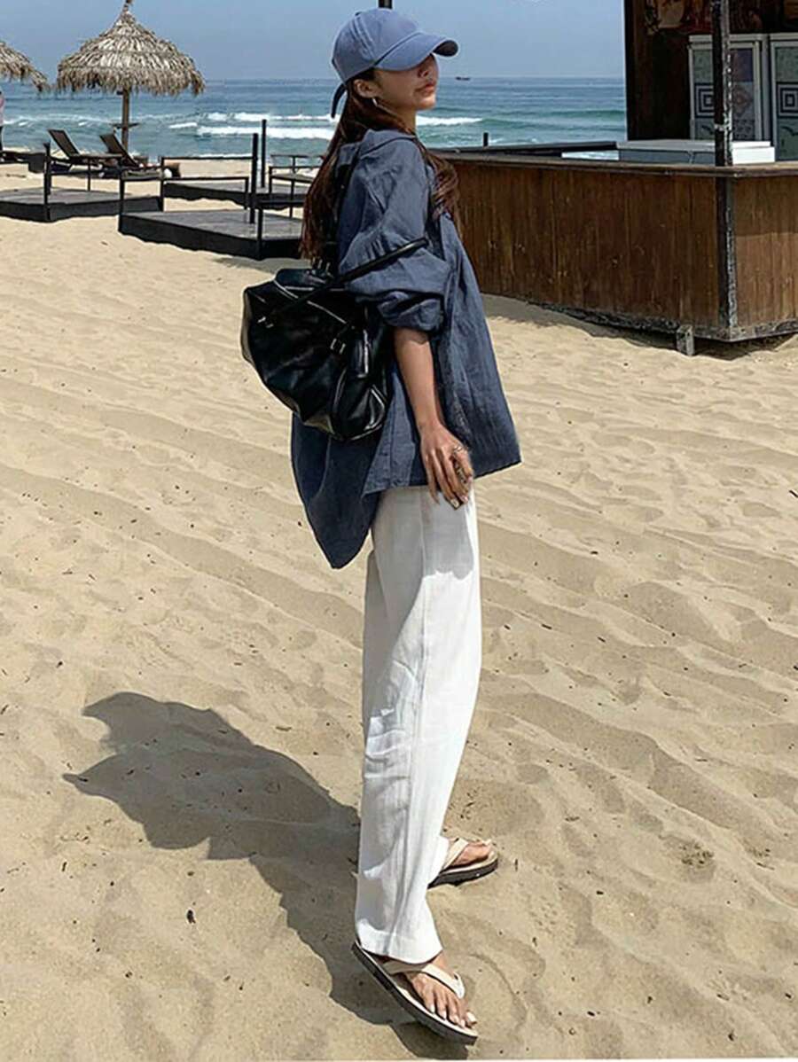 قميص نسائي بأكمام طويلة وأزرار من ديزي