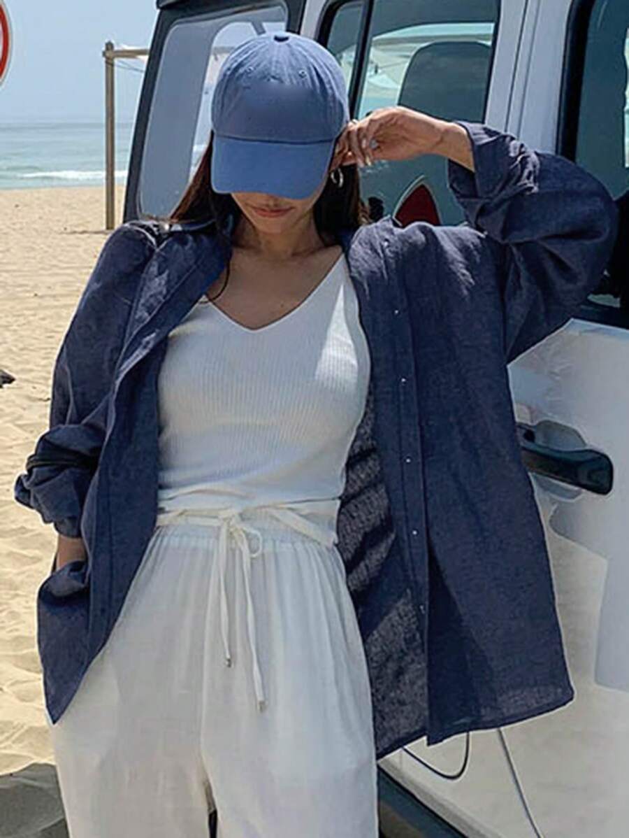 قميص نسائي بأكمام طويلة وأزرار من ديزي