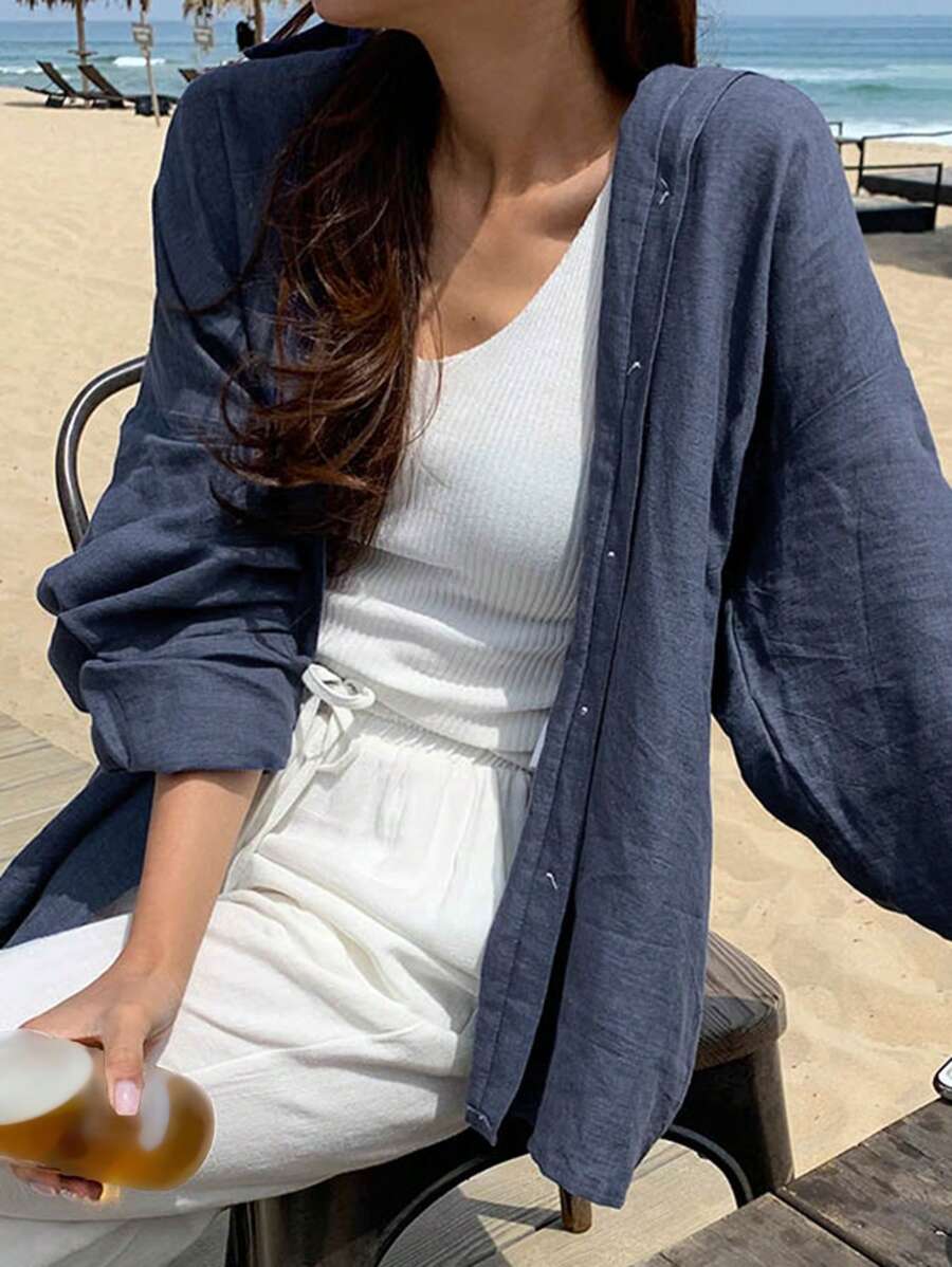 قميص نسائي بأكمام طويلة وأزرار من ديزي