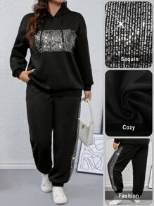 طقم نسائي (قطعتين): هودي مزين بالترتر وبنطلون مخطط بشريط جانبي من كالفايا