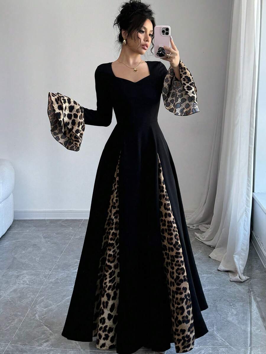 فستان نسائي طويل من Modelyn بطبعة جلد الفهد مع تصميم متباين وفتحة رقبة قلبية