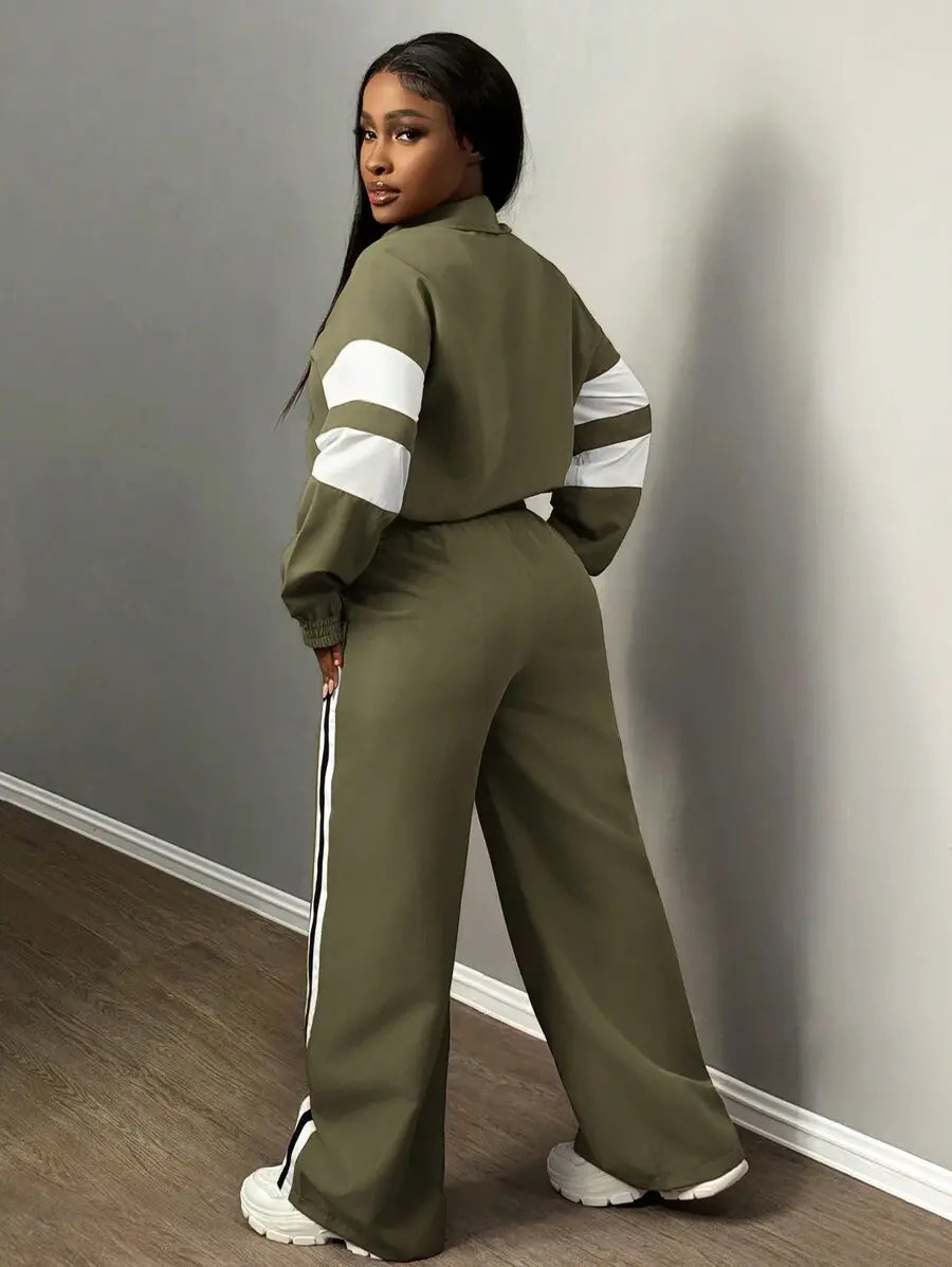 طقم نسائي جديد من Slaydiva، مكون من قطعتين، كاجوال ورياضي، وياقة واقفة، وسحاب، وأكمام طويلة، وكتف مكشوف، وبنطلون واسع الساق