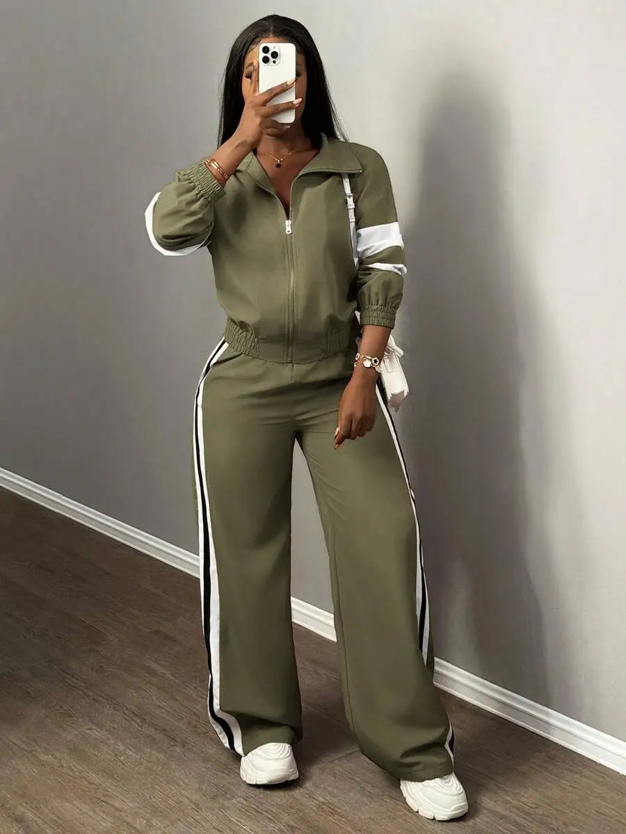 طقم نسائي جديد من Slaydiva، مكون من قطعتين، كاجوال ورياضي، وياقة واقفة، وسحاب، وأكمام طويلة، وكتف مكشوف، وبنطلون واسع الساق