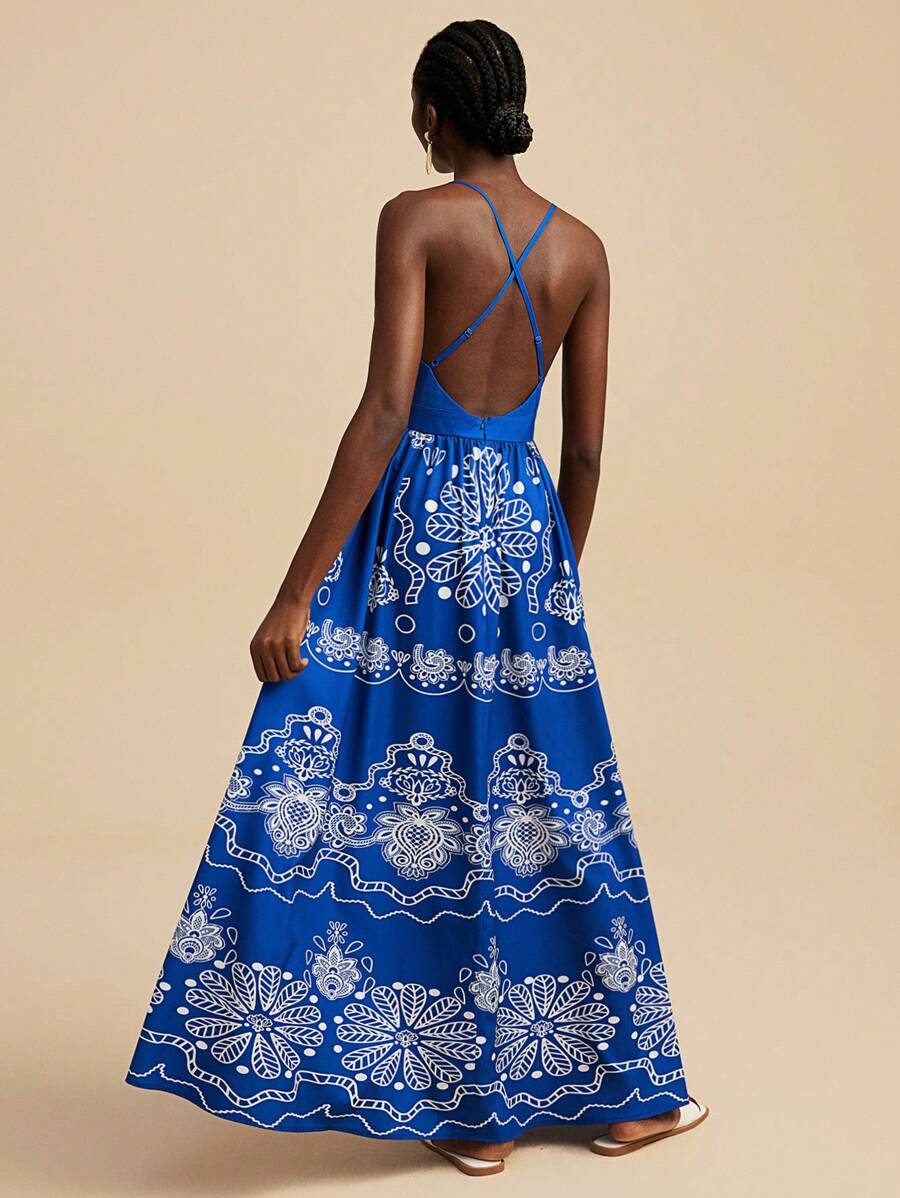 فستان ماكسي سليب بطبعة جرافيكية زرقاء وبيضاء من ترافشيك، أزرق داكن مطرز بنقوش زهرية