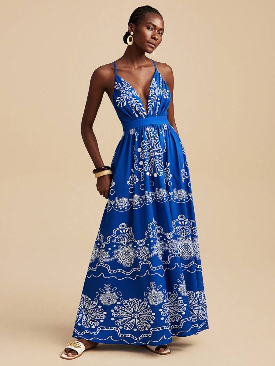 فستان ماكسي سليب بطبعة جرافيكية زرقاء وبيضاء من ترافشيك، أزرق داكن مطرز بنقوش زهرية