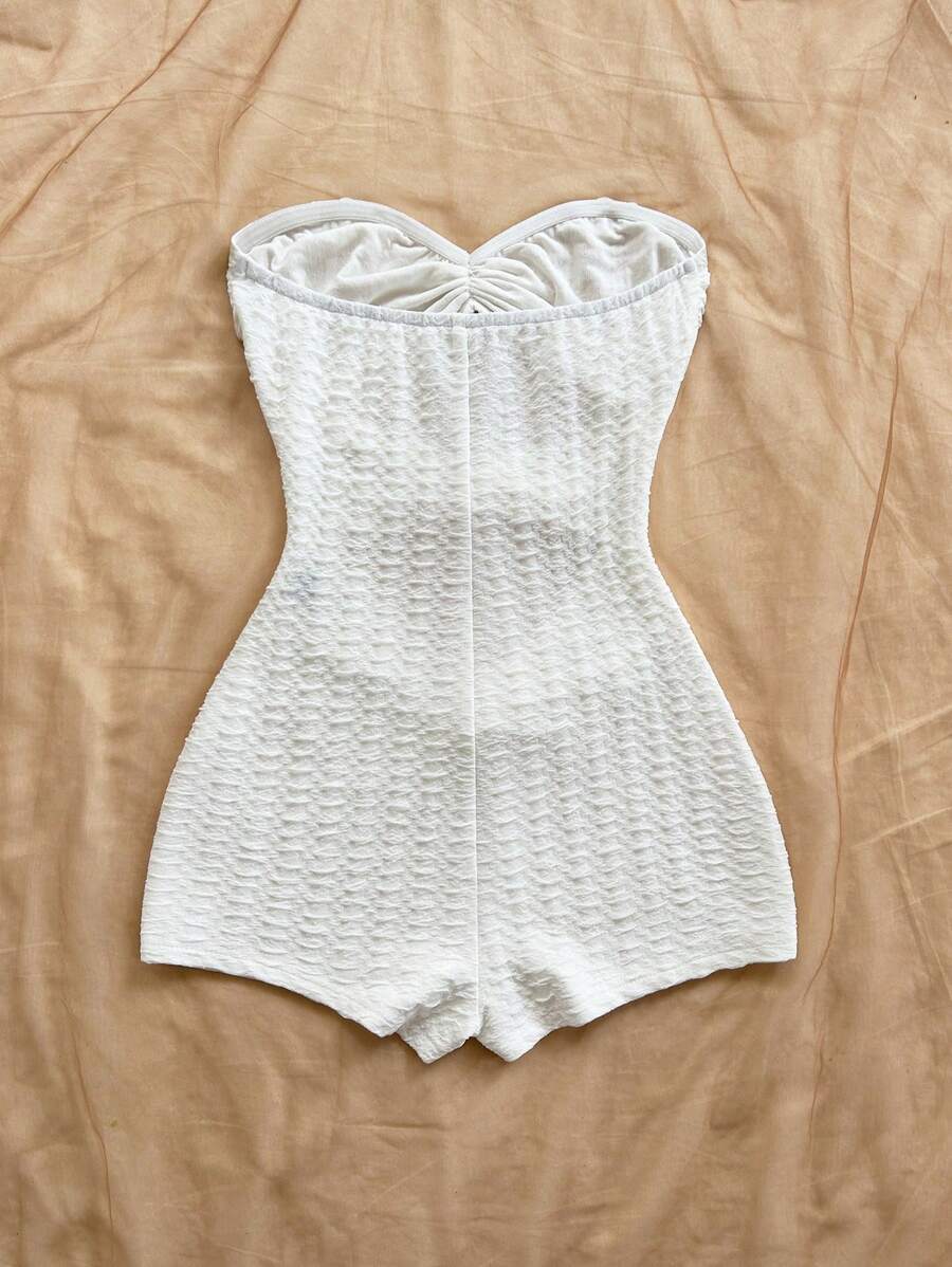 جمبسوت أنثوي أبيض من Soleia  قماش محبوك