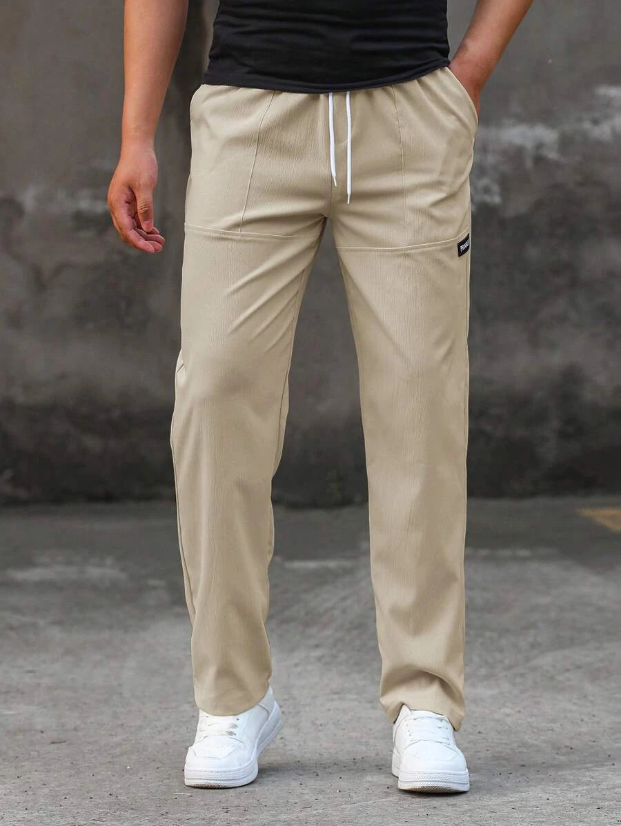 بنطلون رجالي كاجوال برباط على الخصر وقصة ضيقة بتفاصيل رقعة حروف من مانفينيتي هوم - شي إن