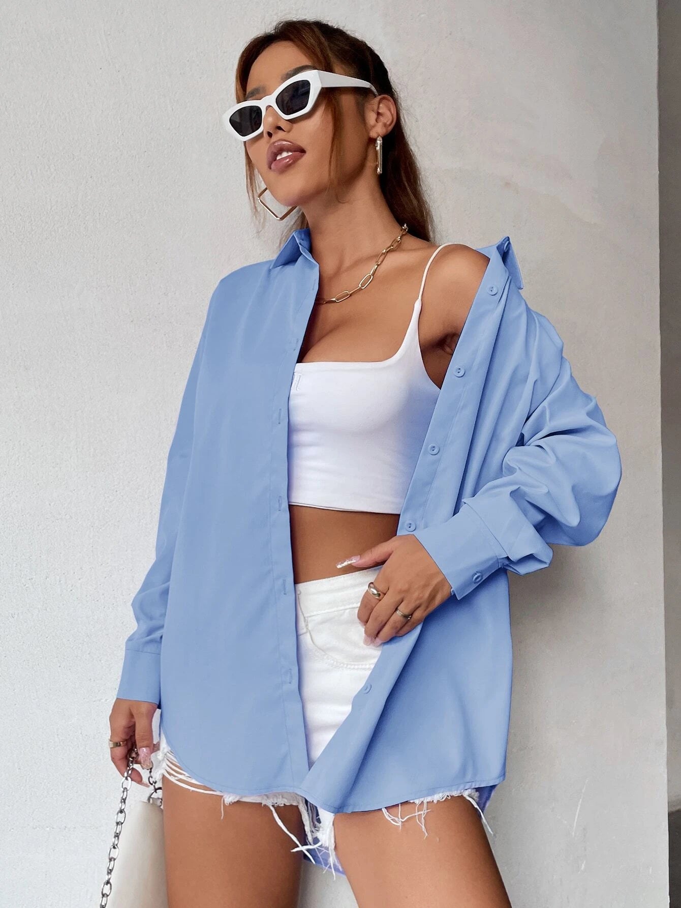 قميص فضفاض بلون سادة وأكتاف منسدلة من إيزي وير – شي إن