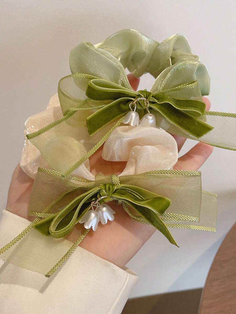 طقم 2 توك شعر مطاطية مزينة بفيونكة وزهرة – مربطات شعر لطلة جميلة وعملية