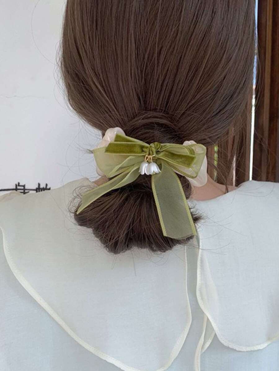 طقم 2 توك شعر مطاطية مزينة بفيونكة وزهرة – مربطات شعر لطلة جميلة وعملية