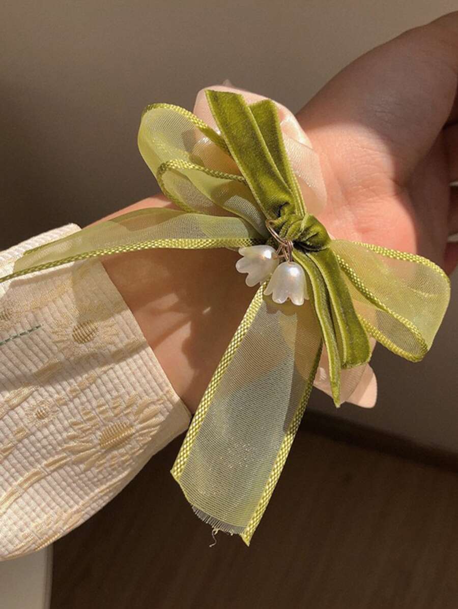 طقم 2 توك شعر مطاطية مزينة بفيونكة وزهرة – مربطات شعر لطلة جميلة وعملية