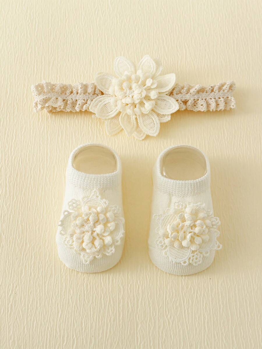 طقم شرابات أطفال بيضاء مضادة للانزلاق مع تطريز زهري + ربطة رأس للرضّع