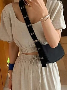 حقيبة كروس صغيرة نسائية مزينة بحلقات معدنية وحزام قابل للتعديل