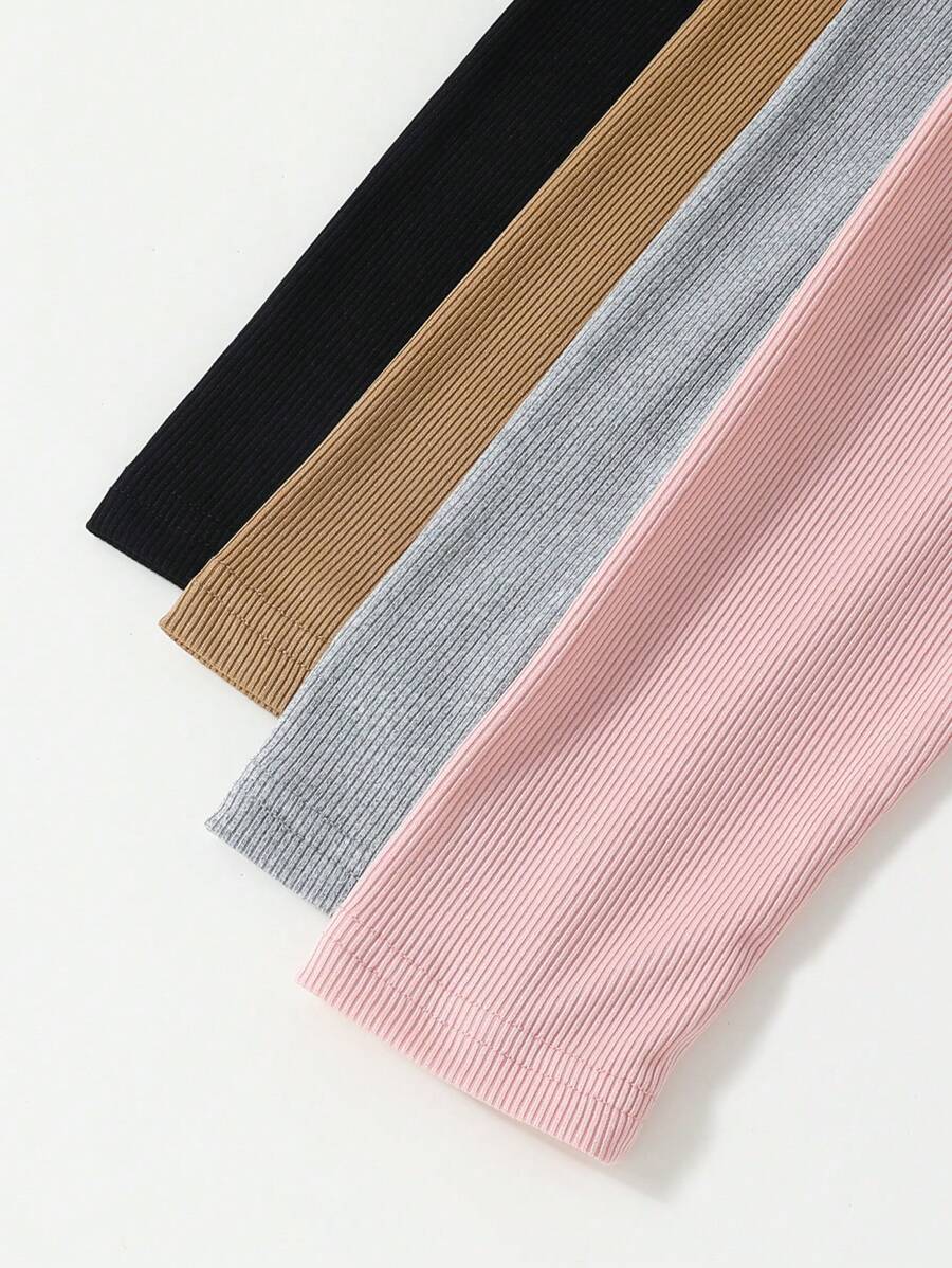 مجموعة من 4 قطع من السراويل الضيقة الملونة الكاجوال للفتيات الصغيرات مع تفاصيل فيونكة لطيفة