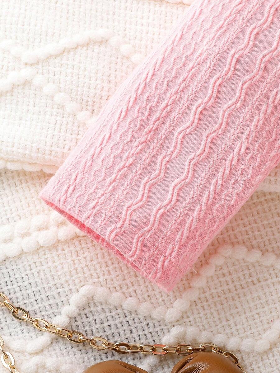 طقم بناتي أنيق من ثلاث قطع، يتكون من جاكيت وتنورة بأزرار أنيقة، مناسب للربيع والخريف