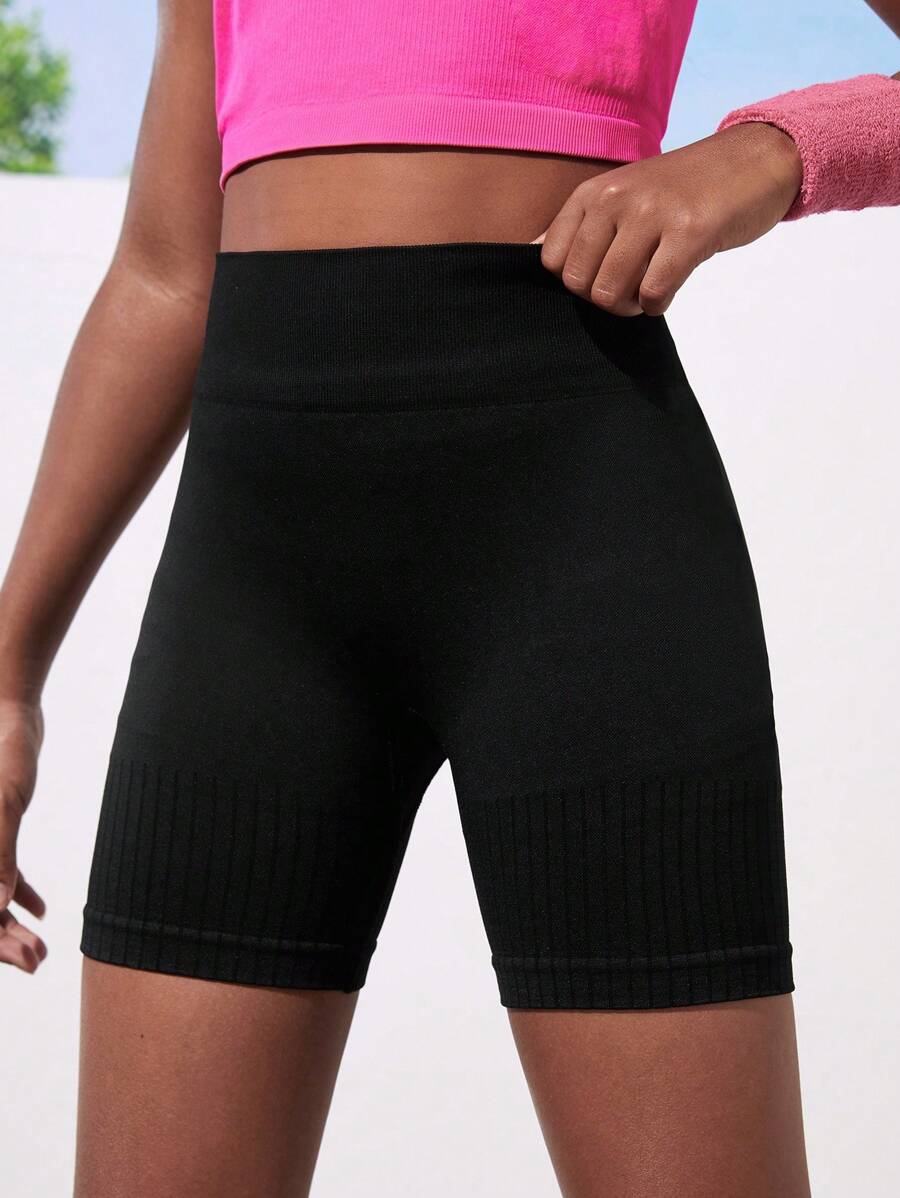 شورت رياضي أسود سلس للبنات من SHEIN Tween – مناسب للجري، اليوغا،