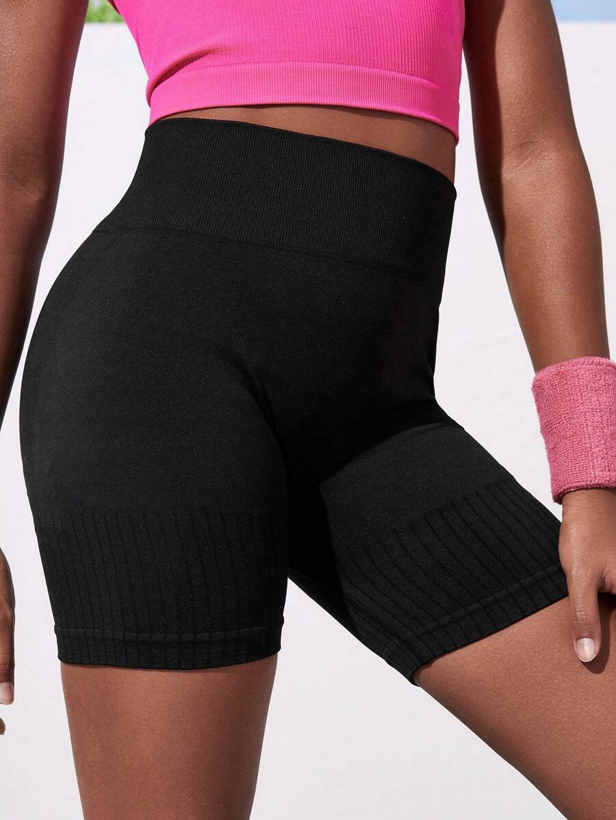 شورت رياضي أسود سلس للبنات من SHEIN Tween – مناسب للجري، اليوغا،