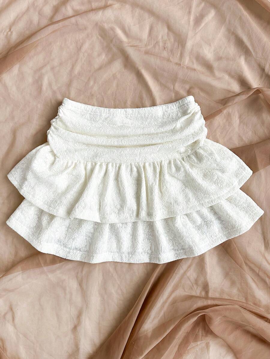 تنورة نسائية من Soleia بحواف مطرزة وفتحة غير متماثلة مع طيات