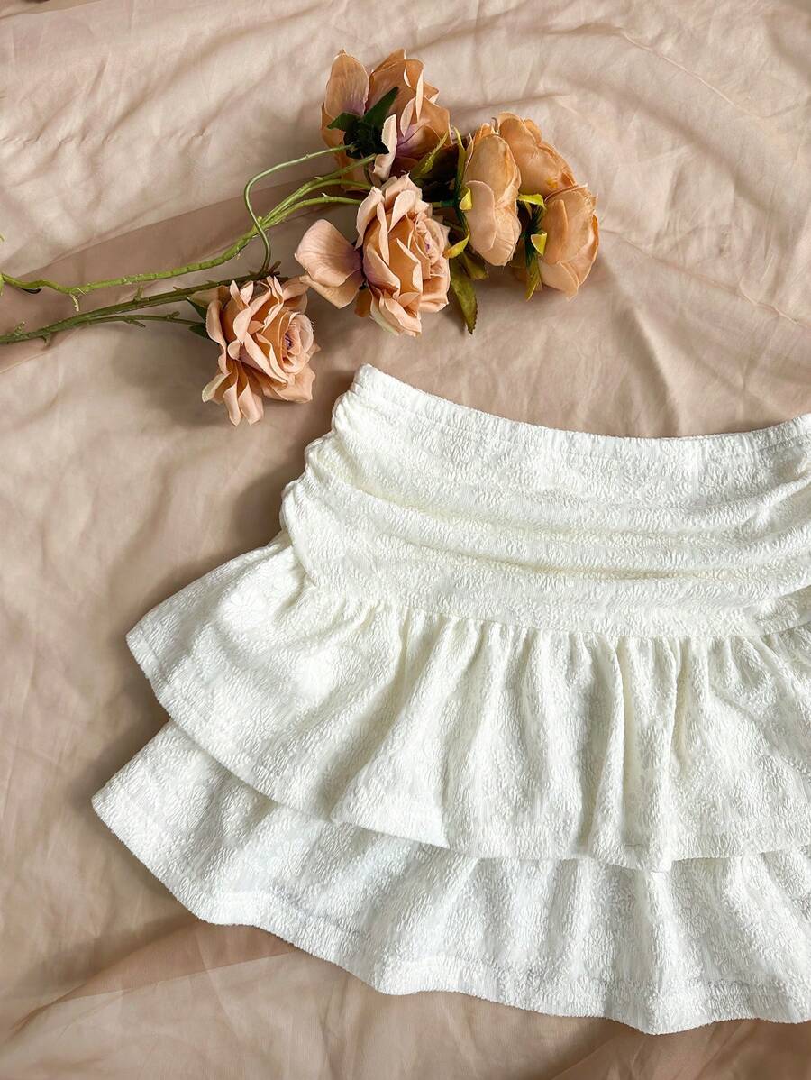 تنورة نسائية من Soleia بحواف مطرزة وفتحة غير متماثلة مع طيات