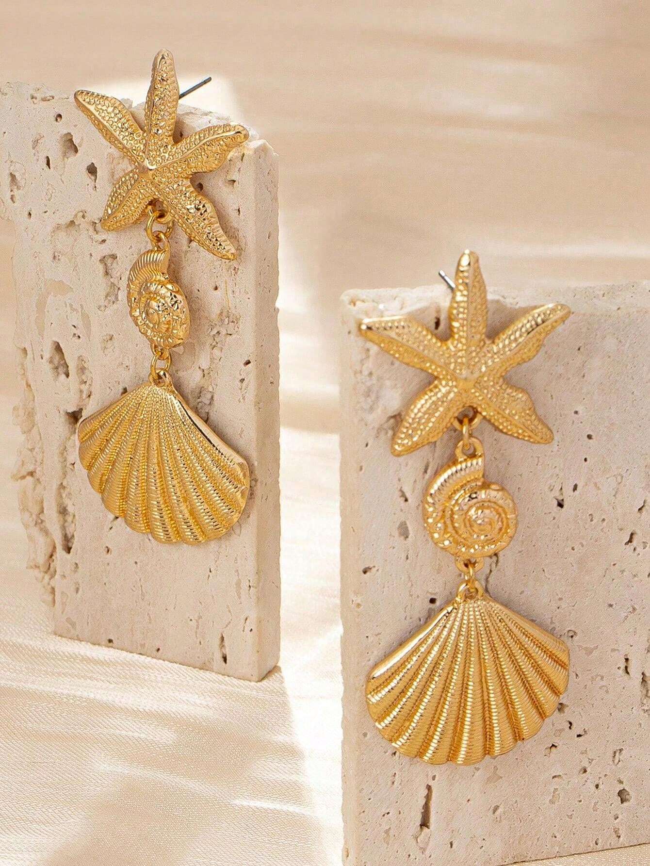 أقراط متدلّية نجمة بحر وصدَف