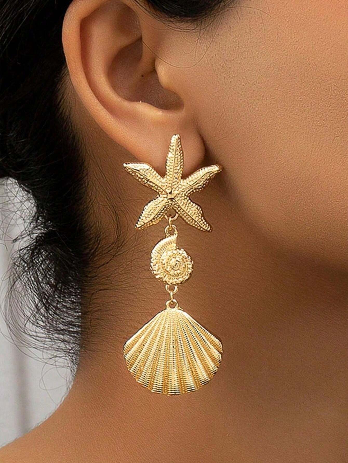 أقراط متدلّية نجمة بحر وصدَف