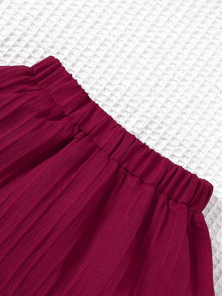 طقم ملابس كاجوال من قطعتين من SHEIN للفتيات الصغيرات مكون من توب وتنورة