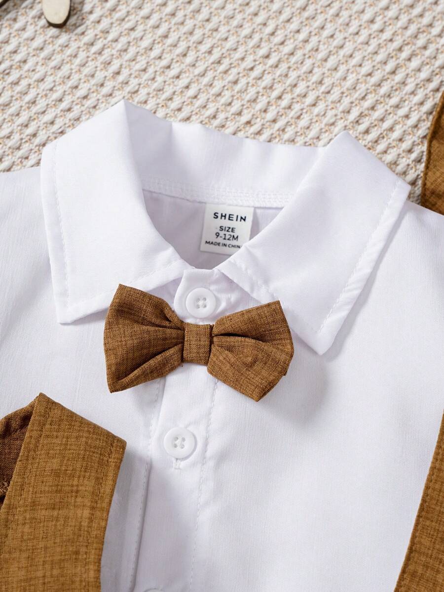 طقم أولادي أنيق من Shein مكوَّن من قميص كم قصير وربطة عنق مع فيست وشورت جاكار