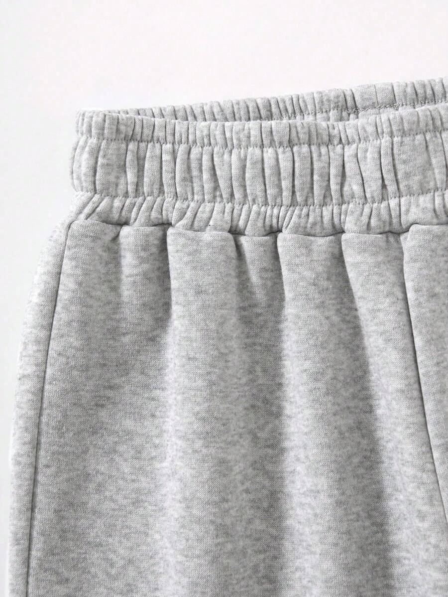 بنطلون رياضي رمادي فاتح من INAWLY Y2K بطبعة جلد النمر والنجوم من Shein