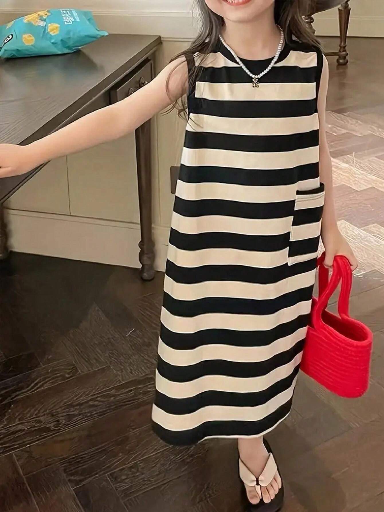 فستان صيفي نسائي-فتاة باللونين الأسود والأبيض – بدون أكمام