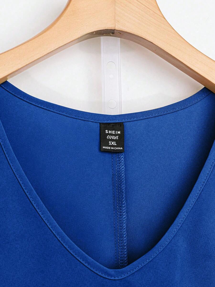 طقم نسائي مقاس كبير من SHEIN – توب بدون أكمام بلون سادة وبنطلون مطبوع، قطعتان لإطلالة عصرية