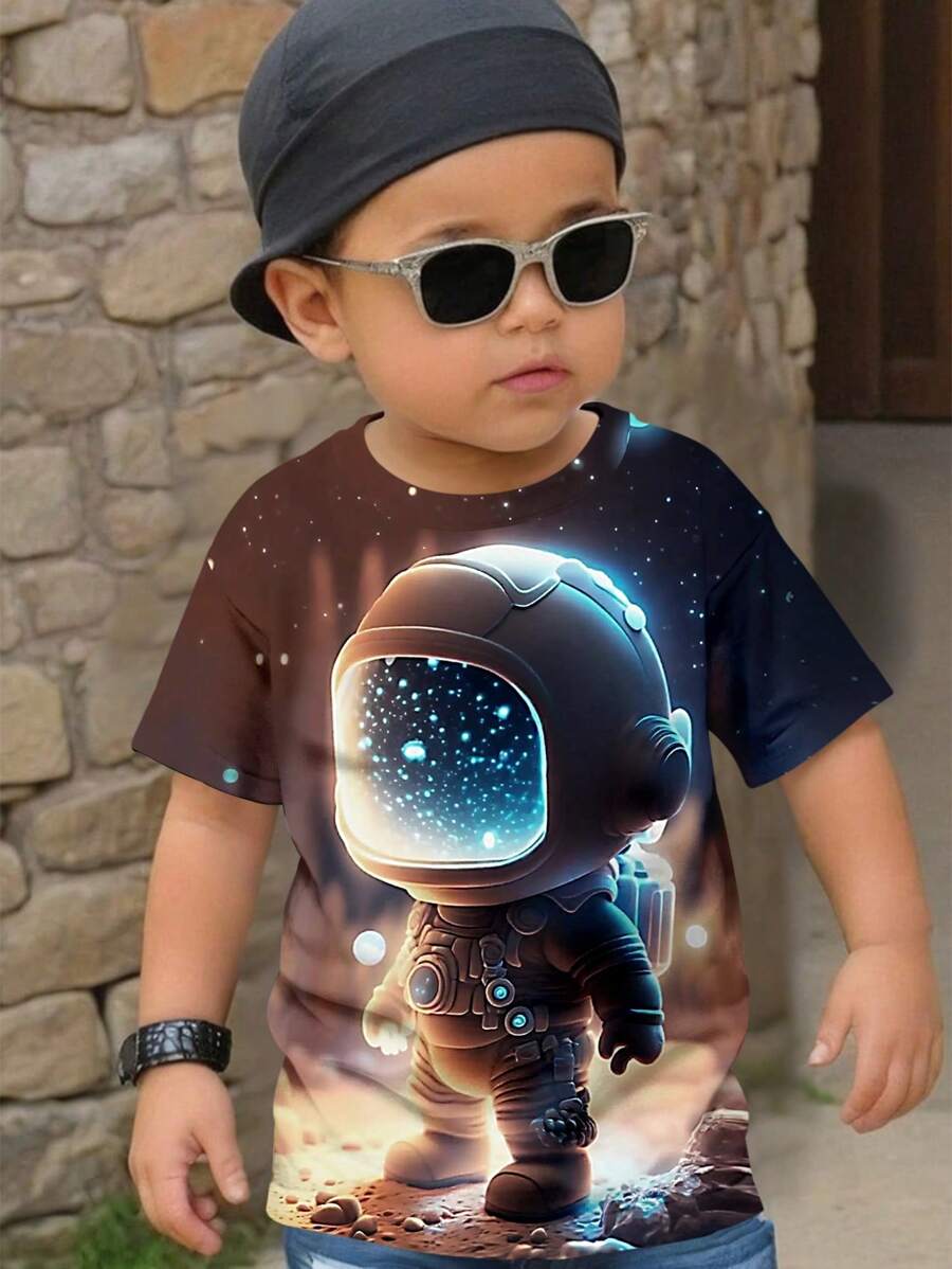 تي شيرت فضفاض بأكمام قصيرة ورقبة مستديرة ورسومات كرتونية بسيطة للصيف للأولاد الصغار مطبوع عليه رائد فضاء من SHEIN