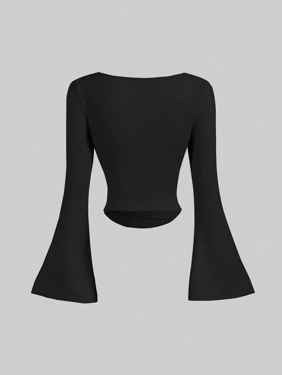 توب نسائي من SHEIN MOD برقبة قارب وأكمام واسعة مع خصر مجمّد