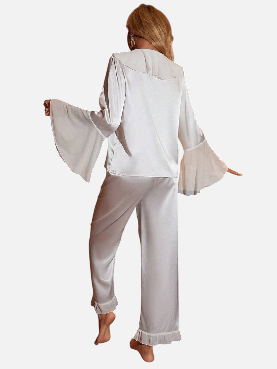بيجامة نسائي من توب بأكمام واسعة وبنطلون طويل بحواف مكشكة من سيلكي سبيل (قطعتين)