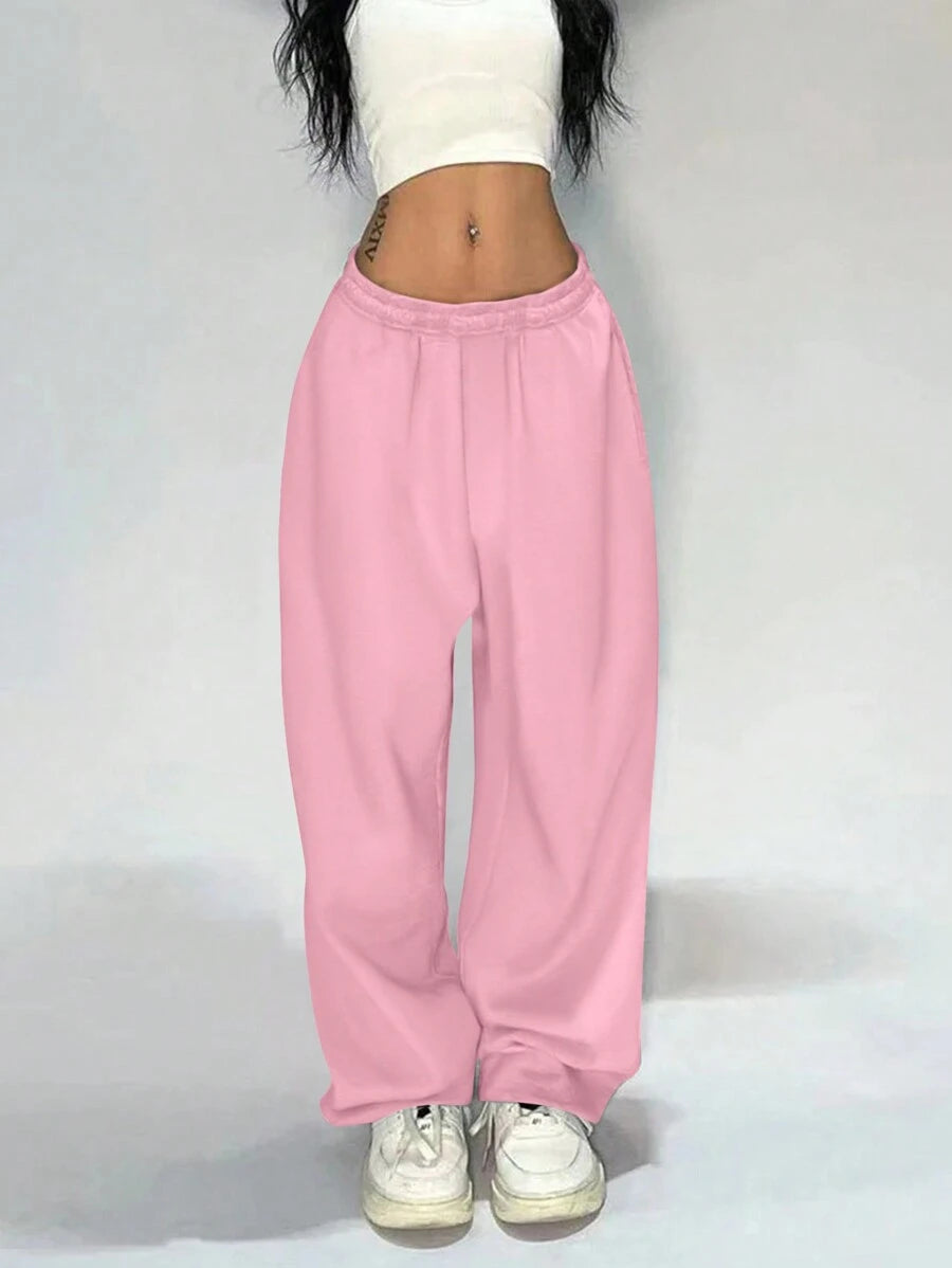 بنطلون رياضي فضفاض واسع الساق بخصر مطاطي بلون سادة من INAWLY للنساء