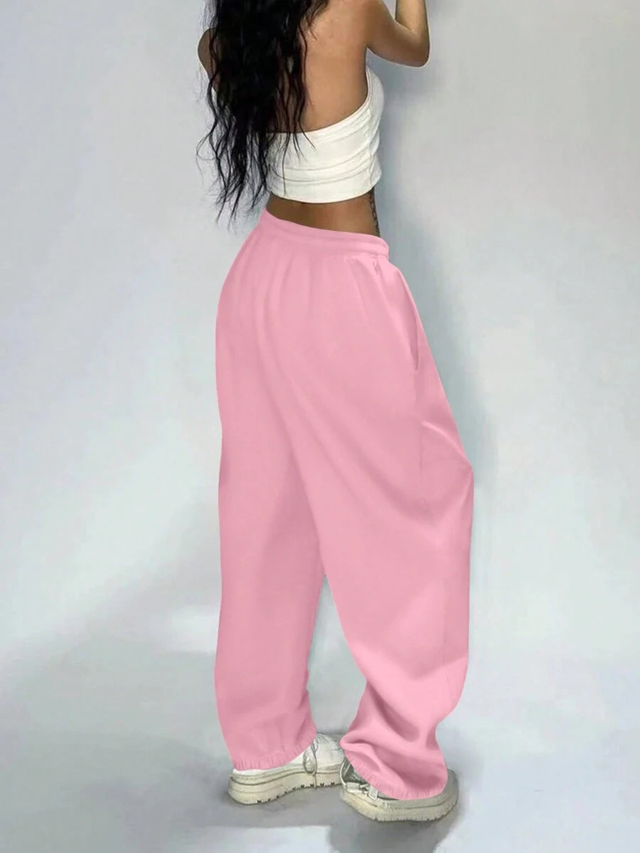 بنطلون رياضي فضفاض واسع الساق بخصر مطاطي بلون سادة من INAWLY للنساء