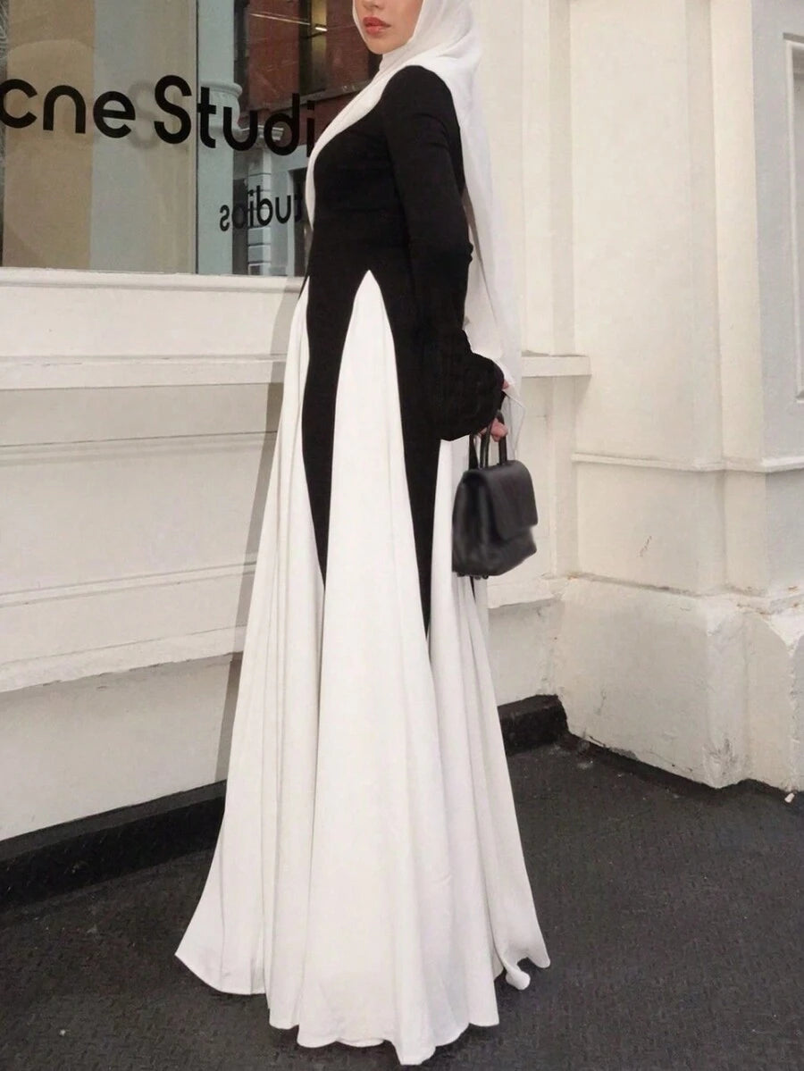 قطعة واحدة من فستان نسائي طويل أنيق بلونين متدرجين متباينين، ألوان ربيعية ناعمة، أكمام طويلة