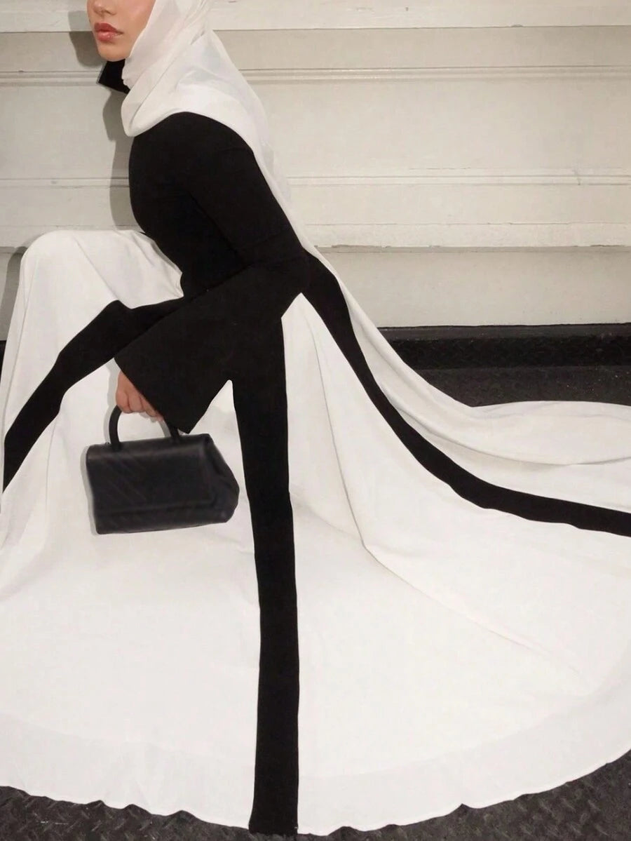 قطعة واحدة من فستان نسائي طويل أنيق بلونين متدرجين متباينين، ألوان ربيعية ناعمة، أكمام طويلة