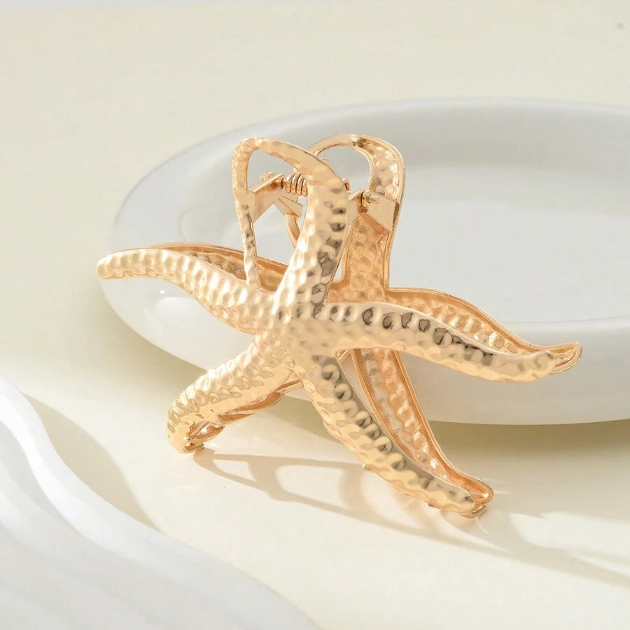 مشبك شعر ذهبي بتصميم نجمة البحر – إكسسوار أنيق للنساء