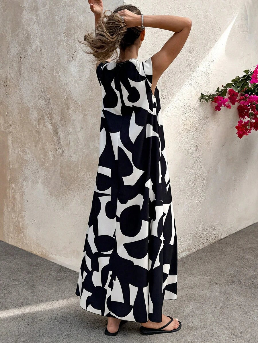 فستان ماكسي واسع بنقشة هندسية بالأبيض والأسودShein