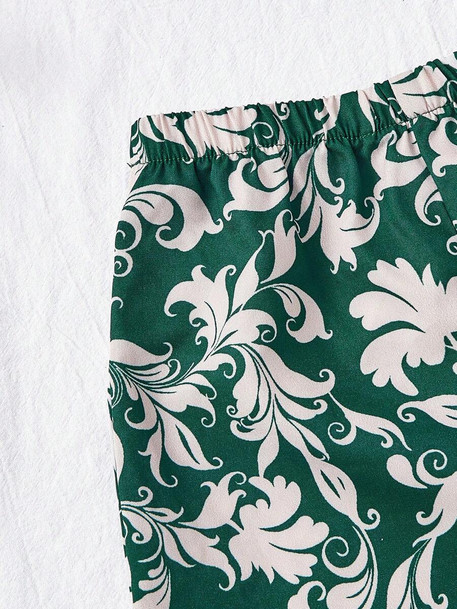 طقم من شي إن – تيشيرت بأكمام قصيرة وبنطال طويل بطبعة زهور صيفية