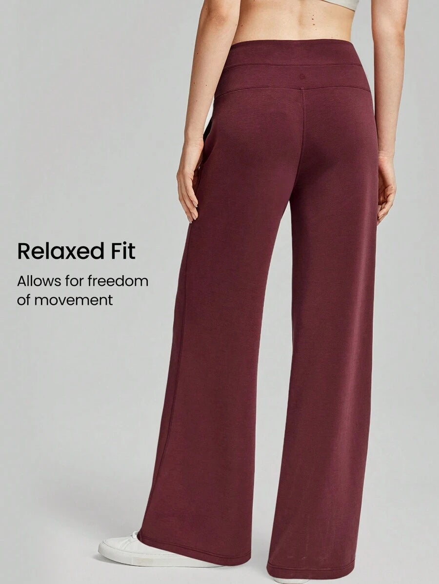 بنطال GLOWMODE واسع عالي الخصر بملمس حريري – بجيوب جانبية