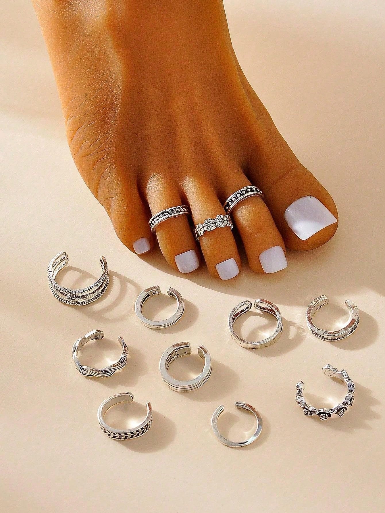 مجموعة 12 خاتم قدم بتصاميم زهرية وهندسية عتيقة