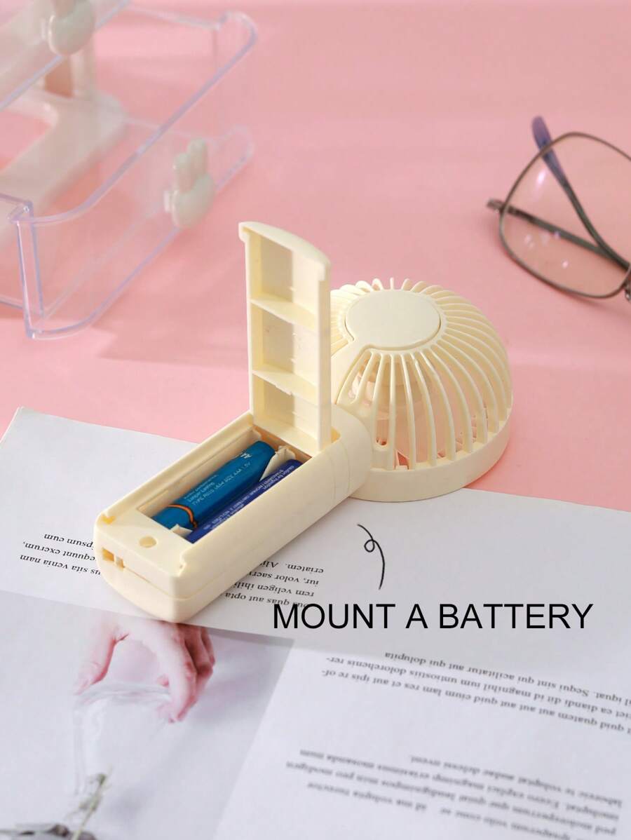 مروحة يد صغيرة محمولة بسرعة واحدة – تعمل ببطارية