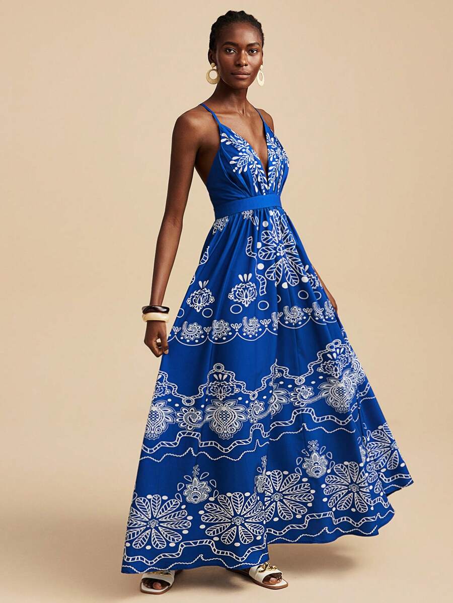 فستان ماكسي سليب بطبعة جرافيكية زرقاء وبيضاء من ترافشيك، أزرق داكن مطرز بنقوش زهرية