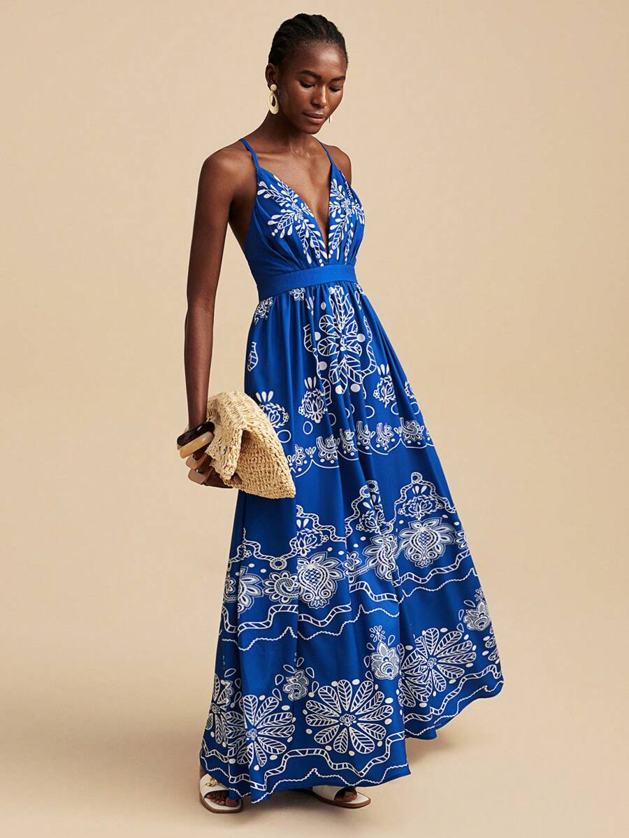 فستان ماكسي سليب بطبعة جرافيكية زرقاء وبيضاء من ترافشيك، أزرق داكن مطرز بنقوش زهرية