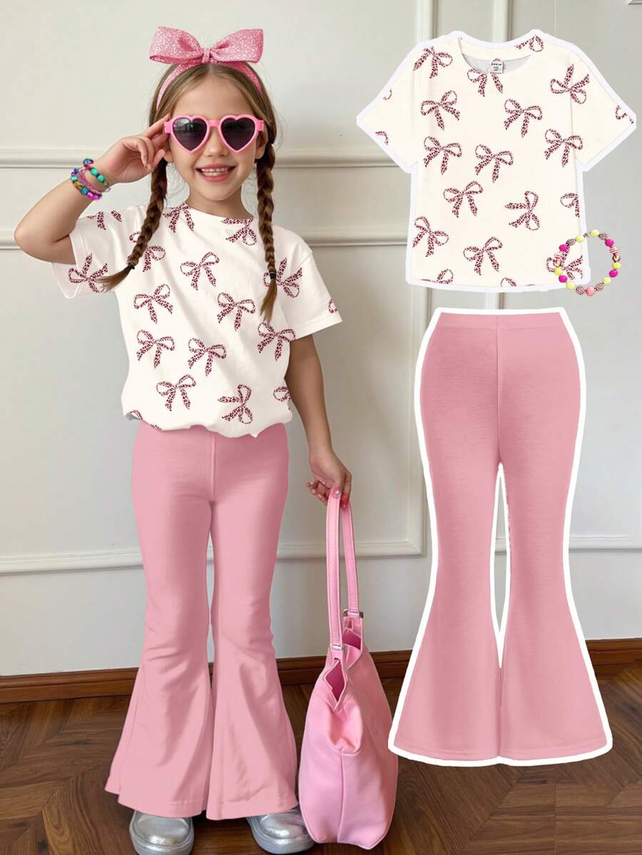 طقم ملابس صيفية كاجوال للبنات من SHEIN مكون من قطعتين، بطبعة جلد الفهد باللون الوردي، مع رقبة مستديرة وأكمام قصيرة، وبنطلون واسع.