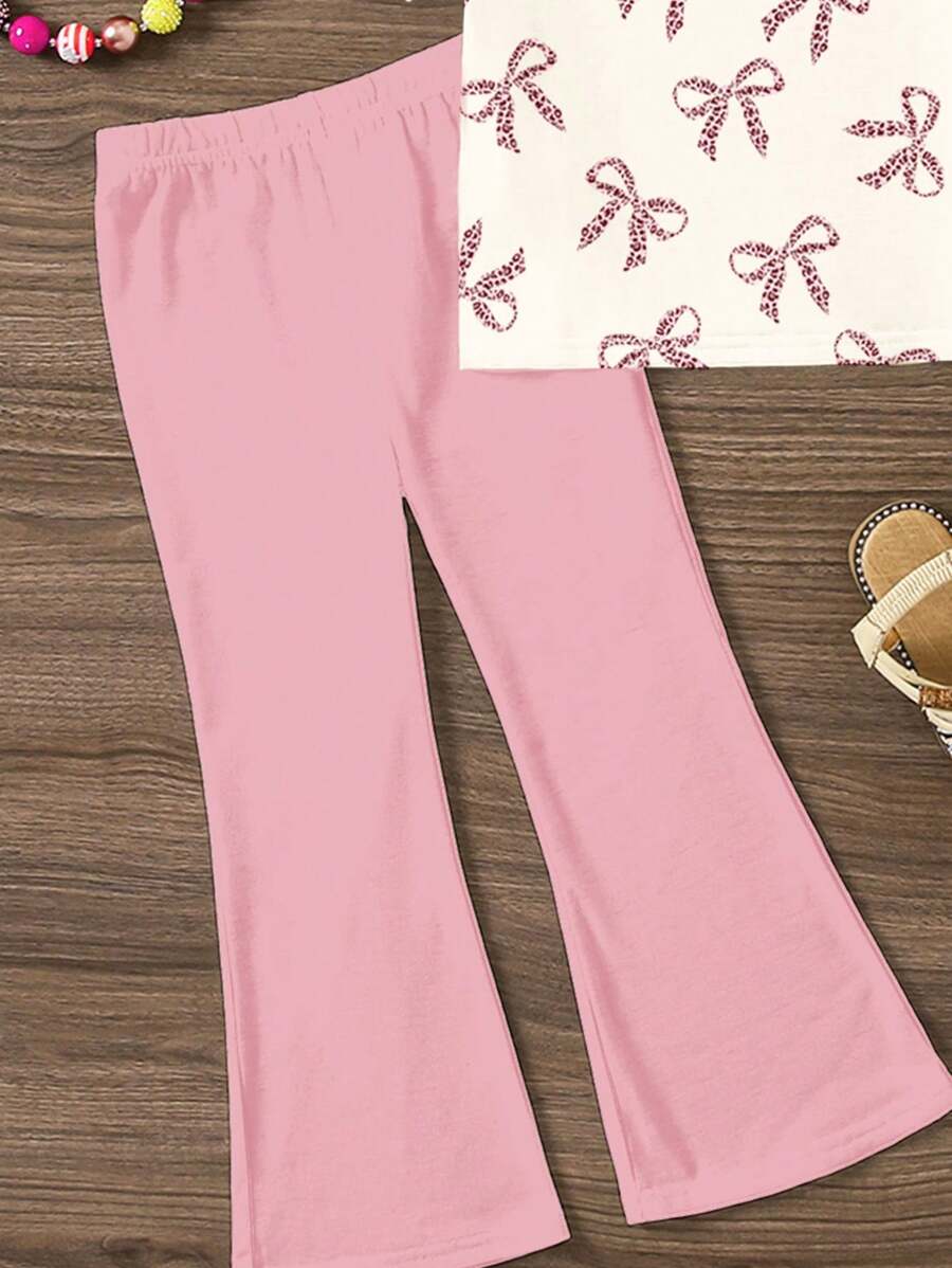 طقم ملابس صيفية كاجوال للبنات من SHEIN مكون من قطعتين، بطبعة جلد الفهد باللون الوردي، مع رقبة مستديرة وأكمام قصيرة، وبنطلون واسع.