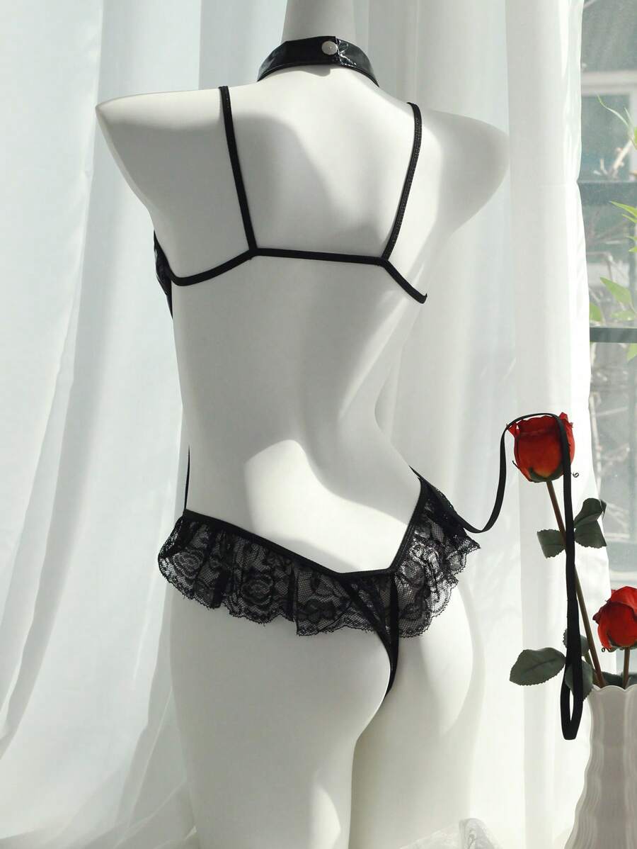 طقم جمبسوت نسائي بونك أسود من الجلد الصناعي – إطلالة جريئة ومثيرة