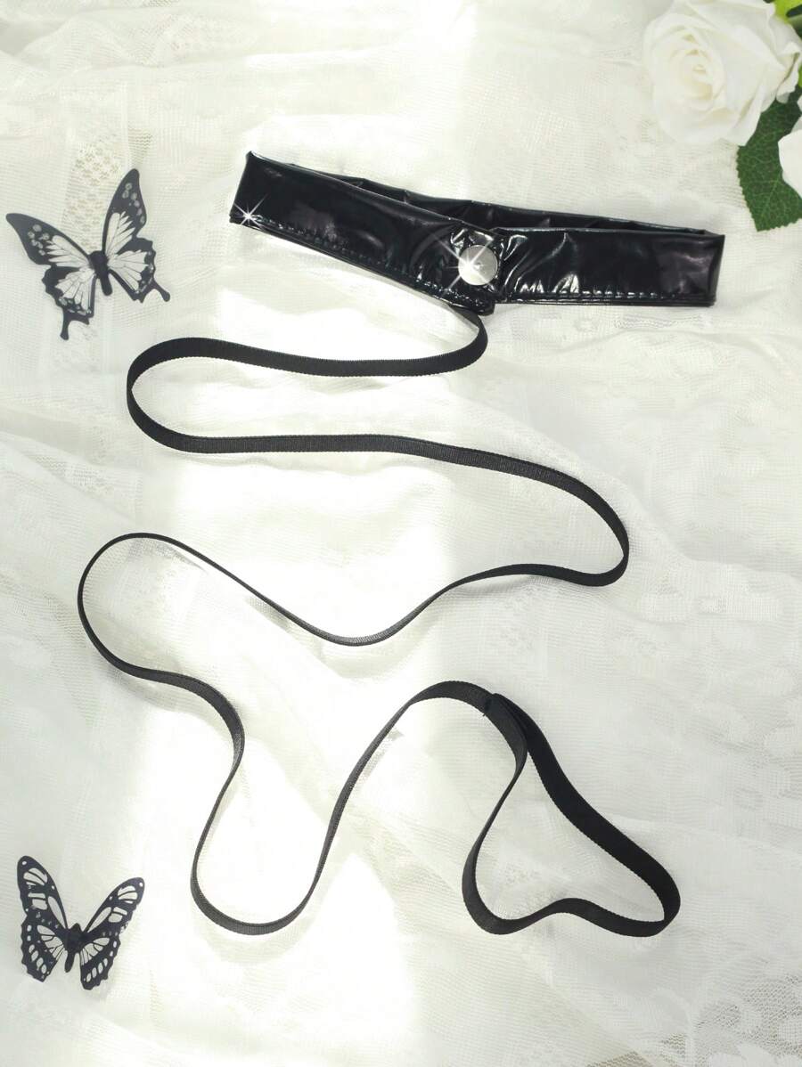 طقم جمبسوت نسائي بونك أسود من الجلد الصناعي – إطلالة جريئة ومثيرة