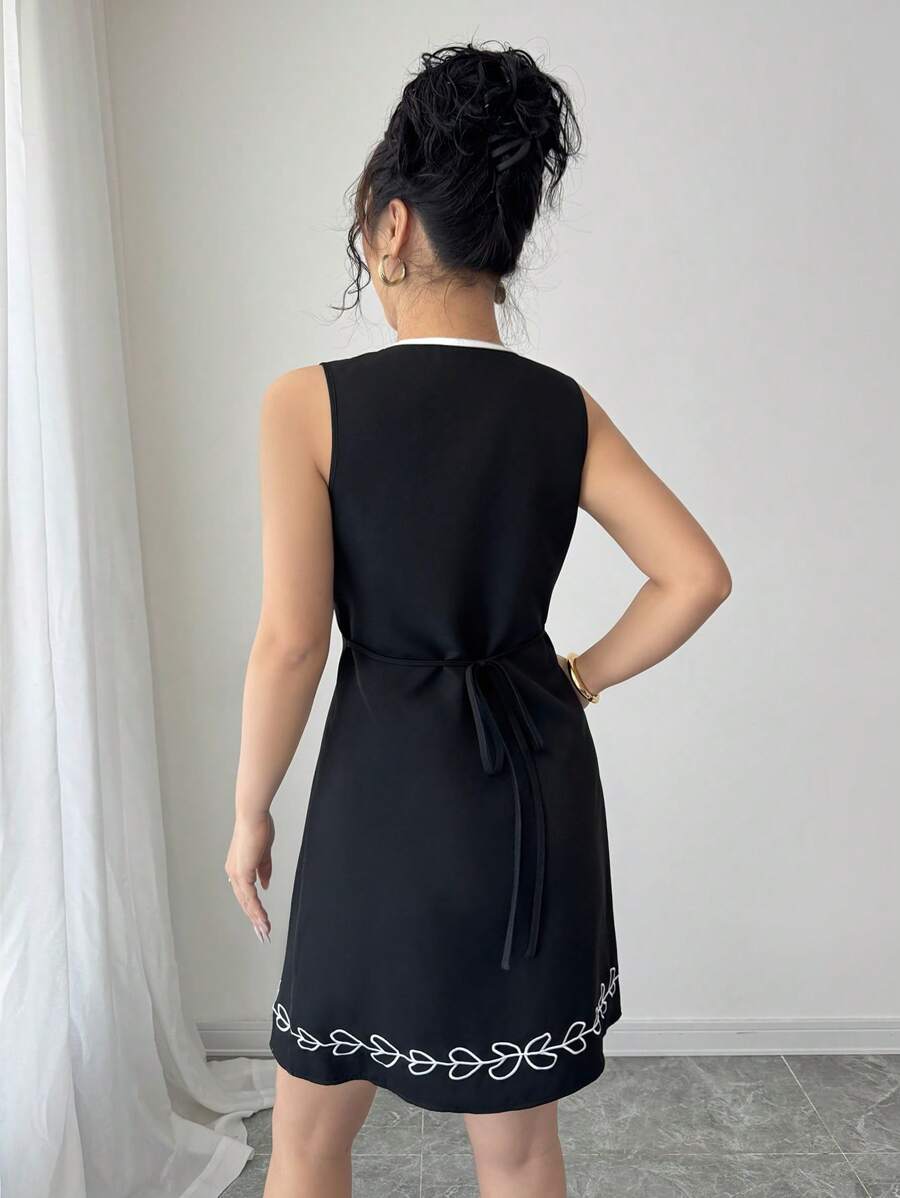 فستان Elenzga أنيق بدون أكمام بتطريز وربطة خصر بتصميم رقبة V